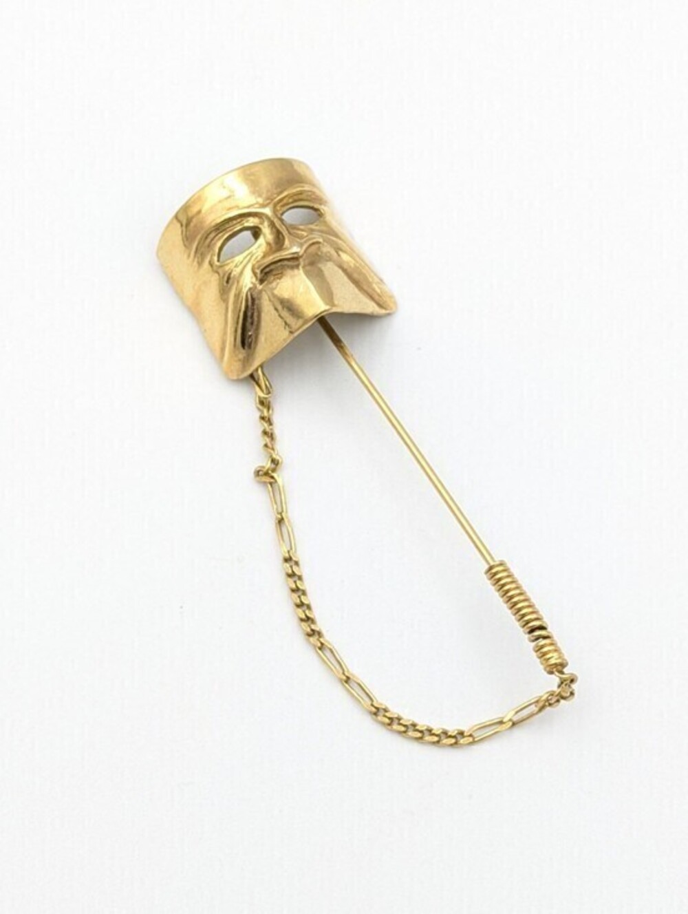 Vintage gold tone mask stick pin with safety chain
